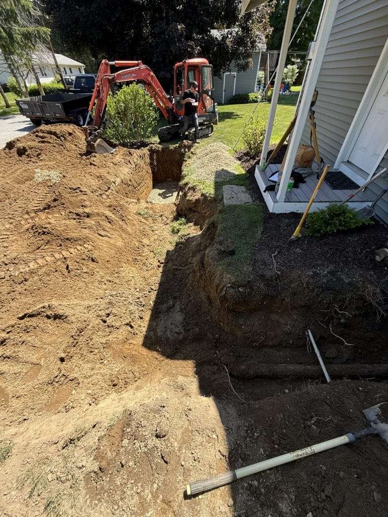 Foundation drainage trench dug beside a home, Hudson Valley NY