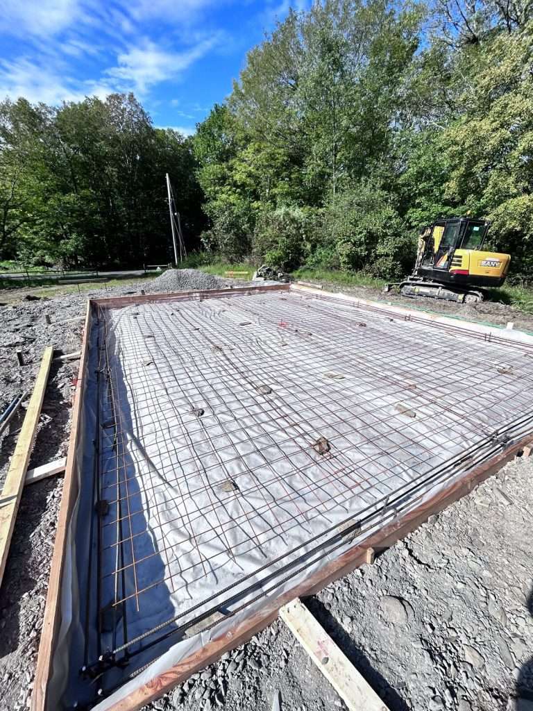Rebar-reinforced foundation slab formed and prepped by Oakley Builders & Excavation, Hudson Valley NY